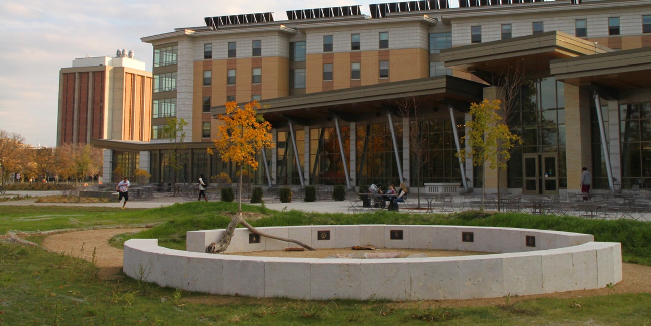 Dejope residence hall lawn and fire pit