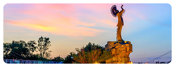 Keeper of the Plains sculpture at sunset