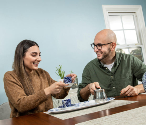 Couple having tea at their table
