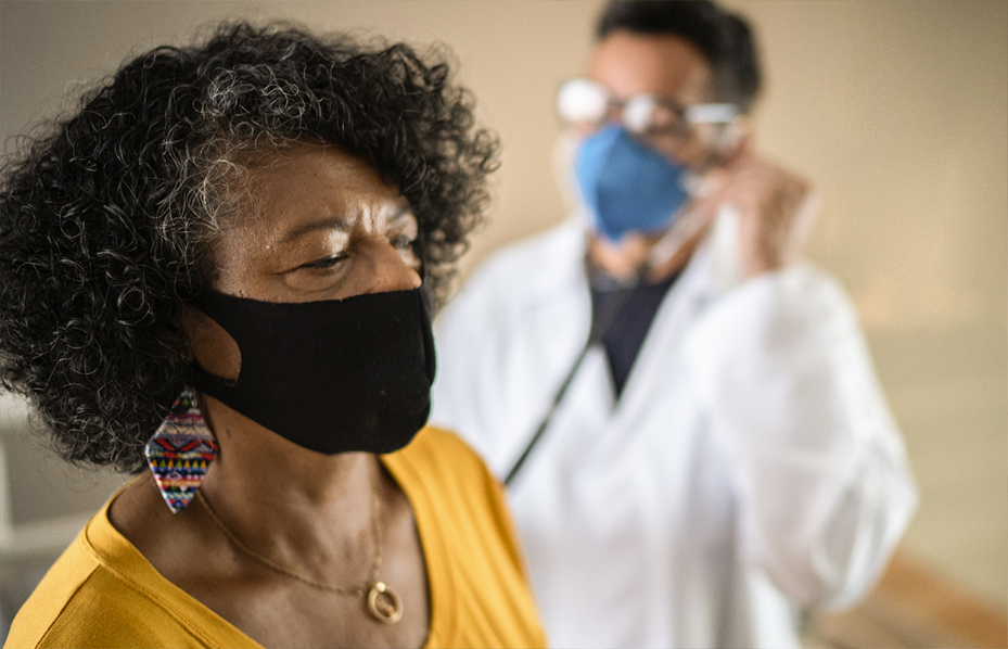 Masked patient with masked doctor