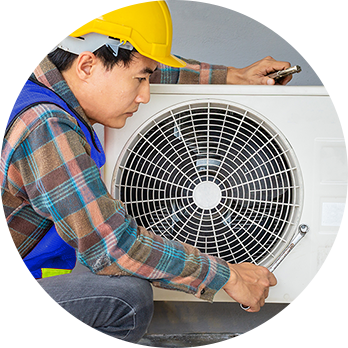 image of a contractor working on an hvac