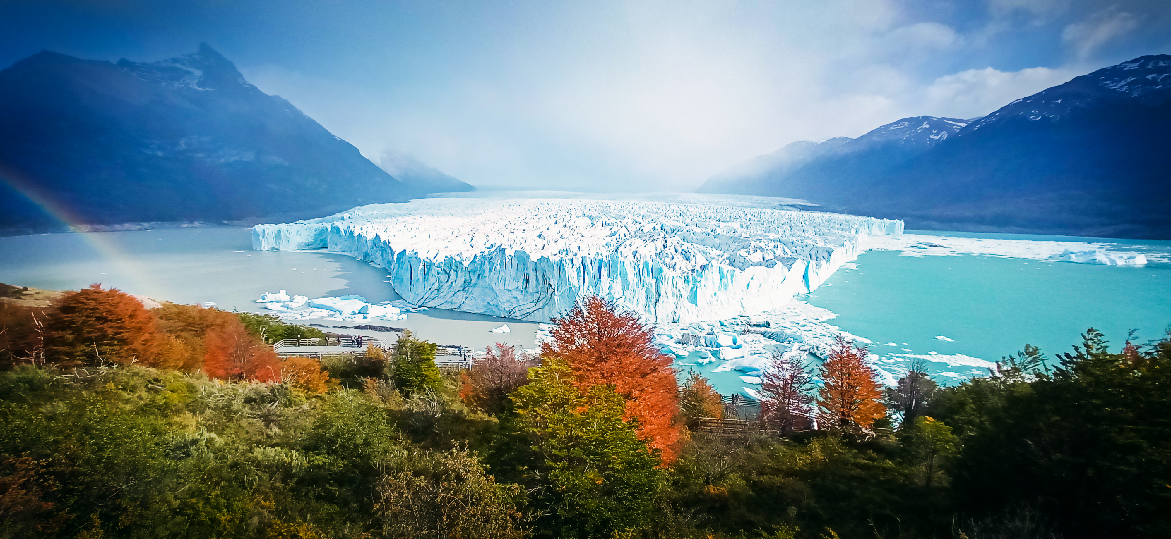 Perito Moreno Glacier in autumn with fog over the mountains