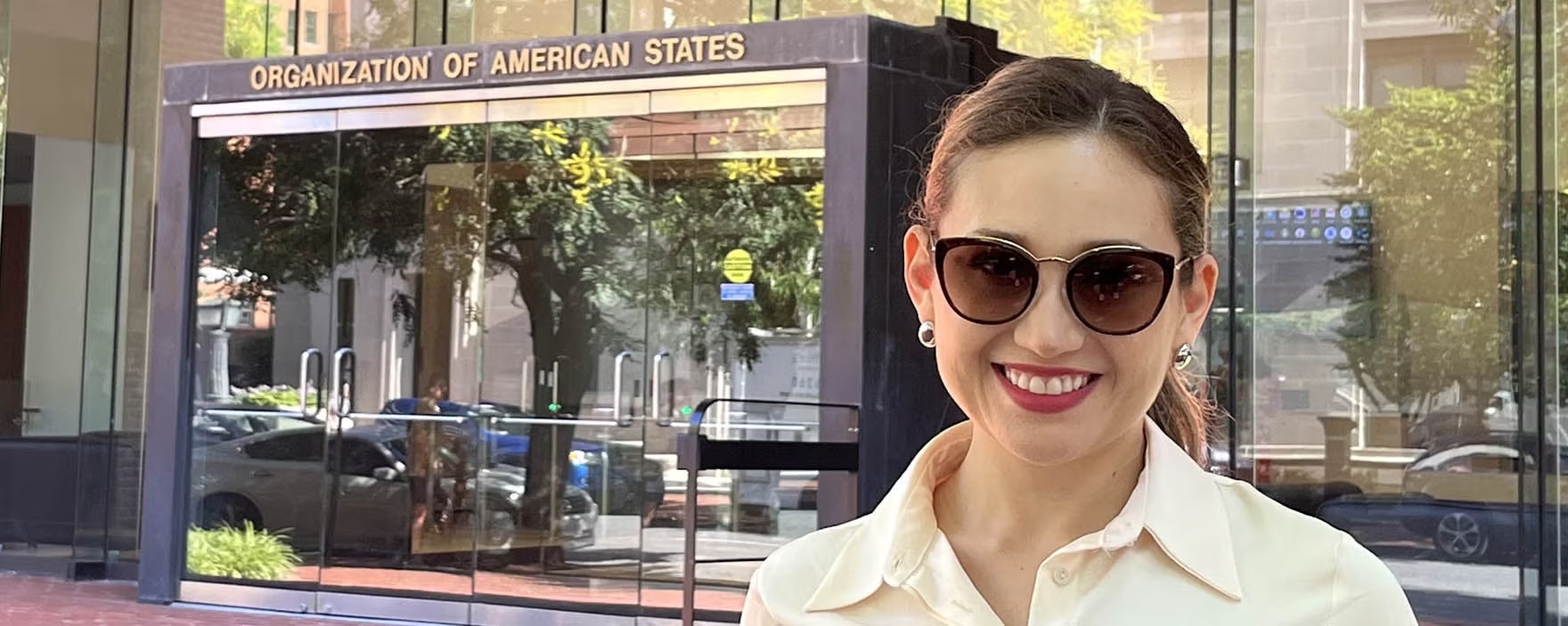 Myriam Becerra in front of Organization of American States building