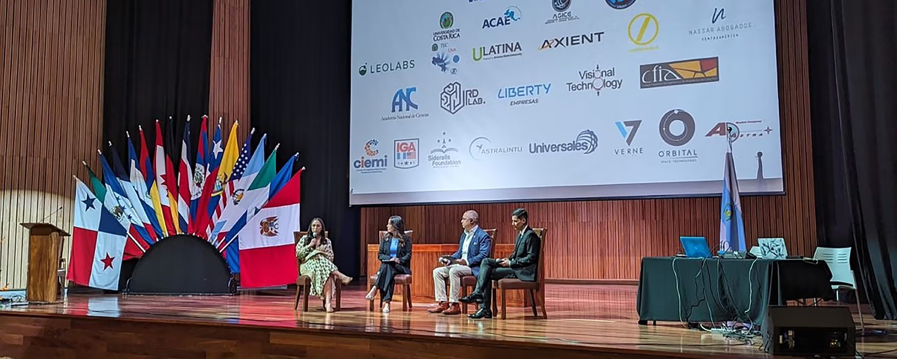 Alina Nassar Jorge on stage in panel