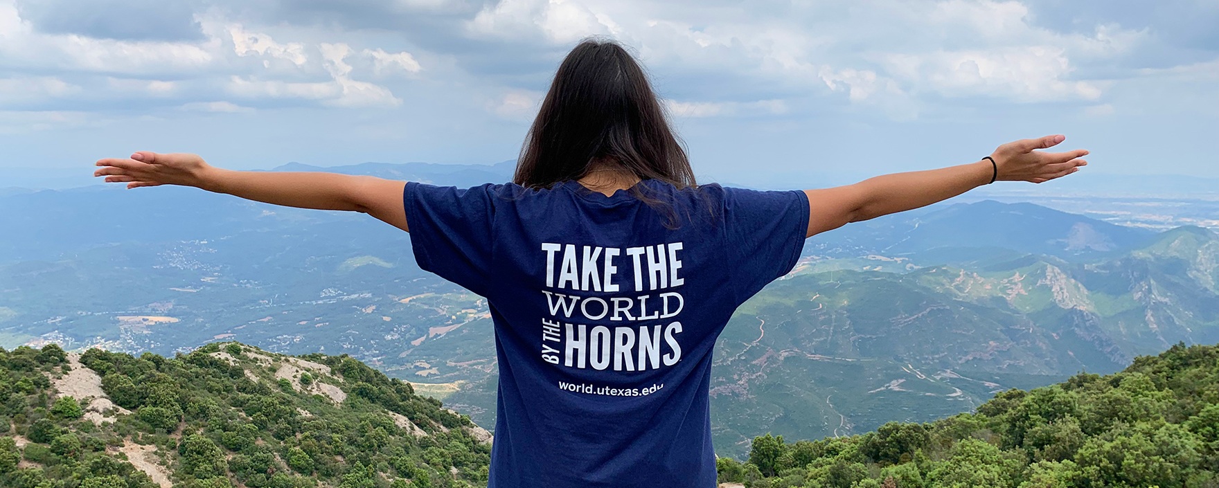 Student wearing Texas Global shirt