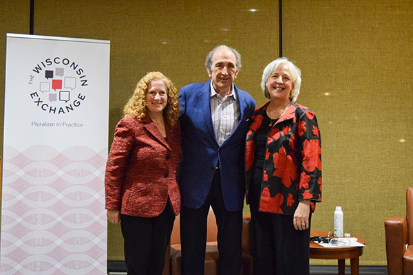 Chancellor Jennifer Mnookin, Andy Lack and Kathleen Bartzen Culver pose together next to a banner that reads "The Wisconsin Exchange"