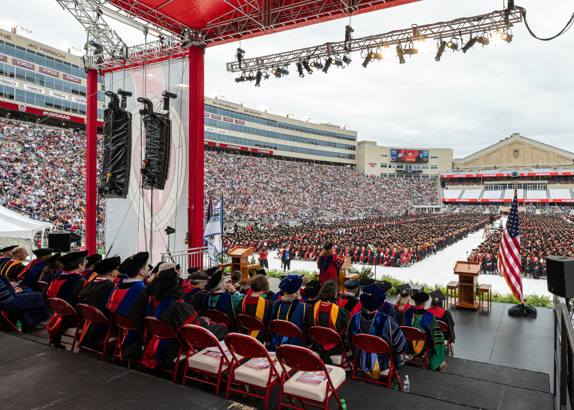 A view of the graduation ceremony at Camp Randall from the stage.