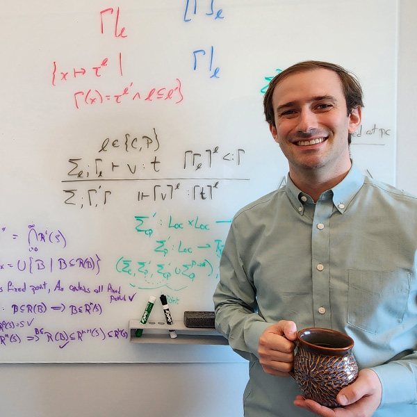 Assistant Professor Ethan Cecchetti.