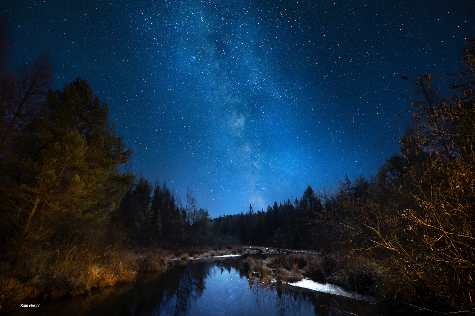 photo of the Milky Way over the Aurora Creek in Vilas County by Kate Reichl