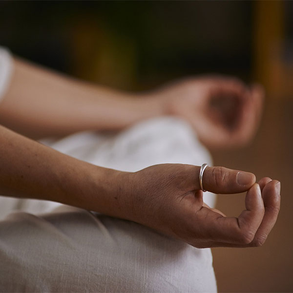 Person doing lotus yoga pose