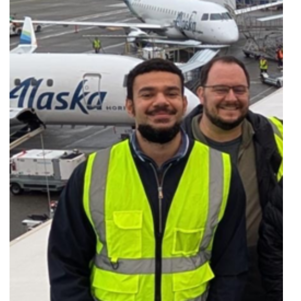 Thomas Triplett and colleague on the runway