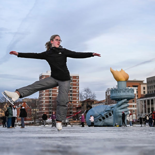 UW-Madison Winter Carnival ice skater on frozen lake