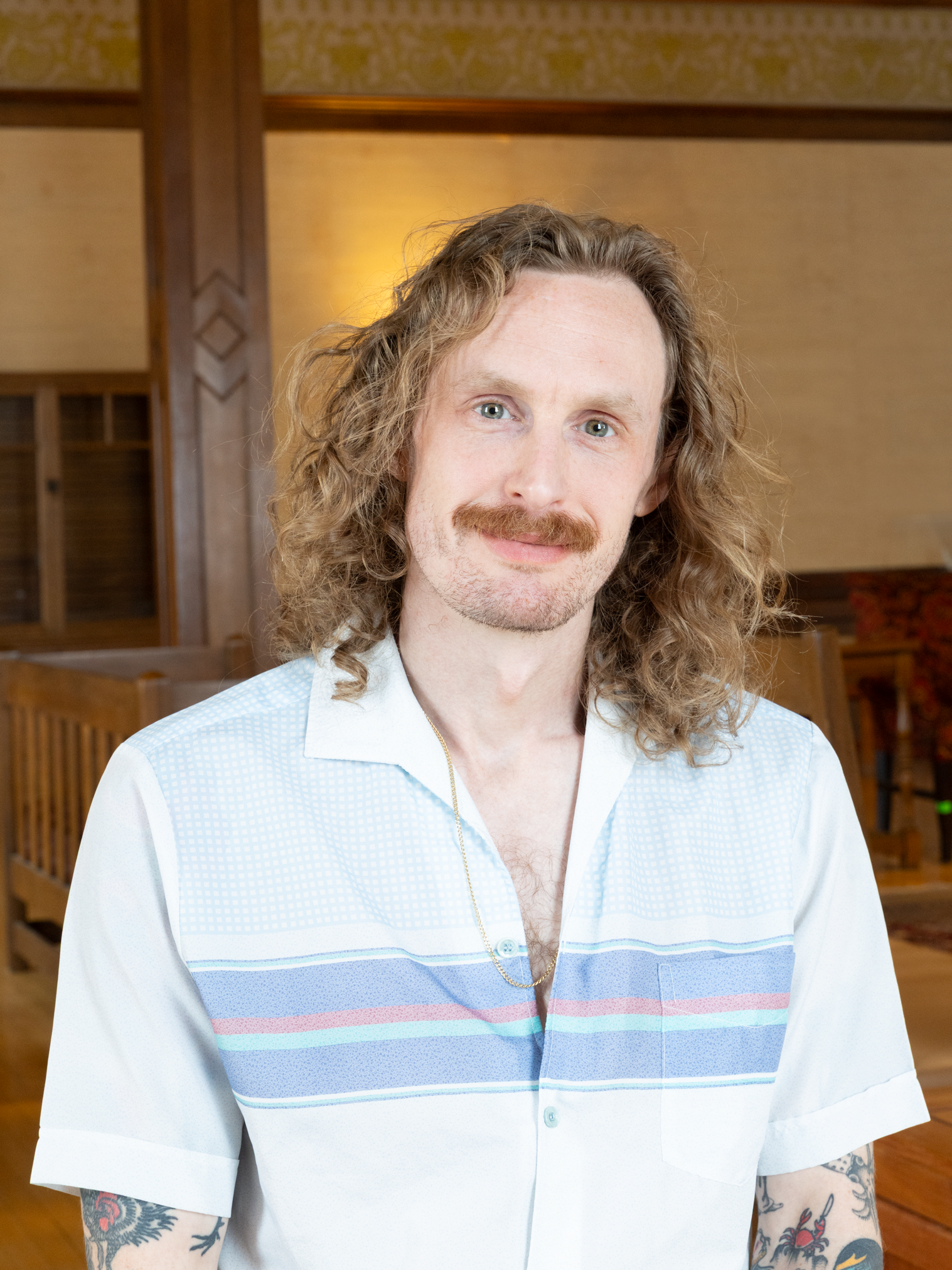 Headshot photo of Aaron Granat, videographer at the Division of the Arts.