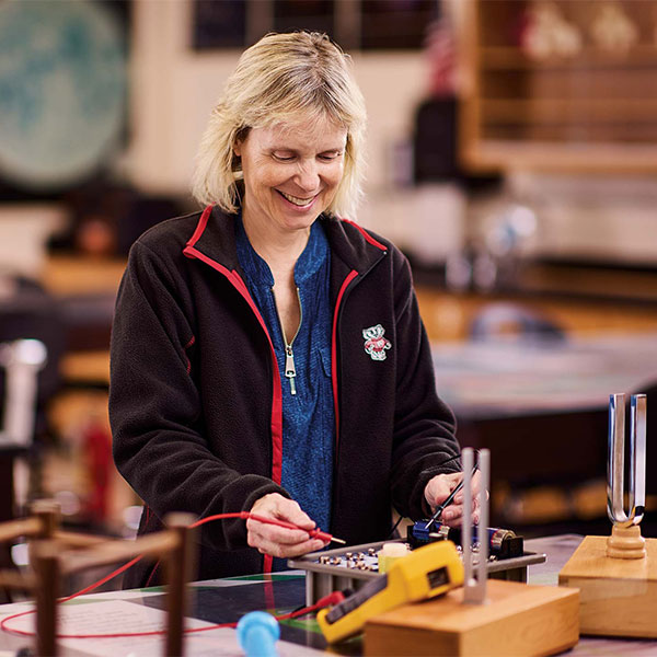 Casey Durandet working in physics lab.