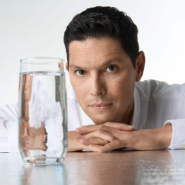 Professor Manny Teodoro posed with glass of drinking water