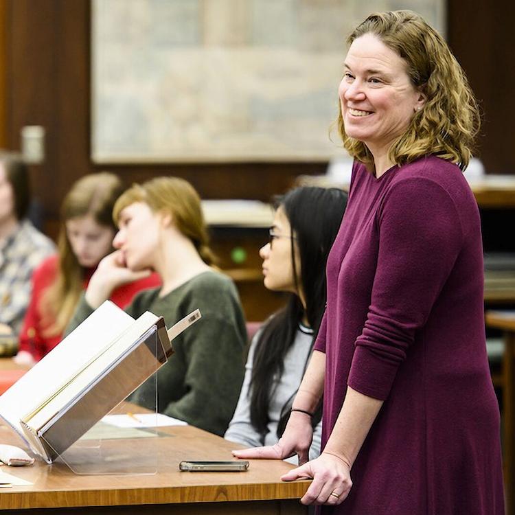 Professor Anna Andrzejewski smiles during her lecture. Photo courtesy of UW–Madison Communications.