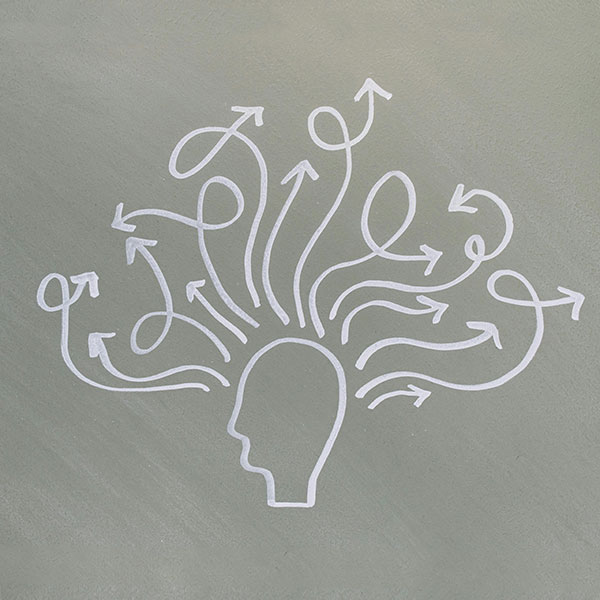 Illustration of human head with thought arrows going in all directions.
