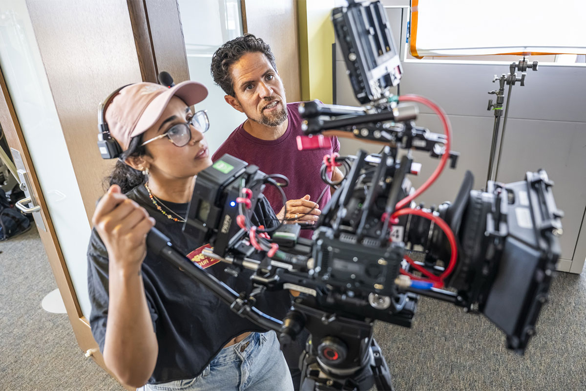 Cinematographer Trina Mulligan and writer and director Aaron Greer consult on a scene while filming Morning Moon.