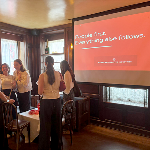 A group of people gathered for the first Badgers in Creative Industries event. Photo by Laura Hensen.