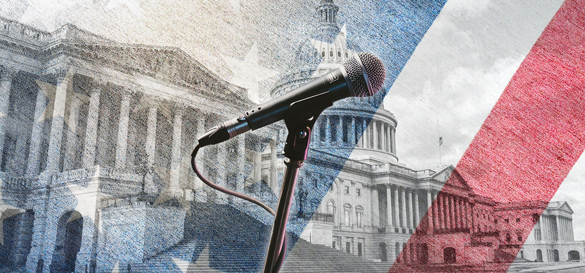 Stand up microphone infront of United States Capitol backdrop.