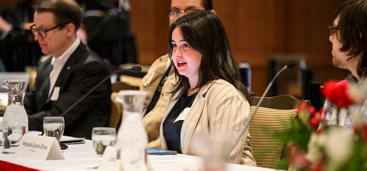 Miranda Garcia-Dove speaking at an event.