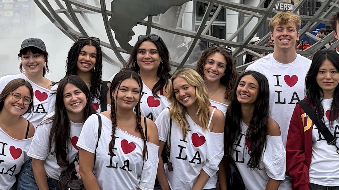 A group of students in the Creative Careers in Hollywood program pose wearing "I Heart LA" shirts.
