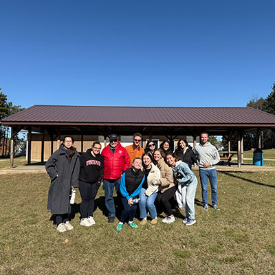 Students pose together in DeForest, Wisconsin while on a field trip for their creative campaign messaging class.