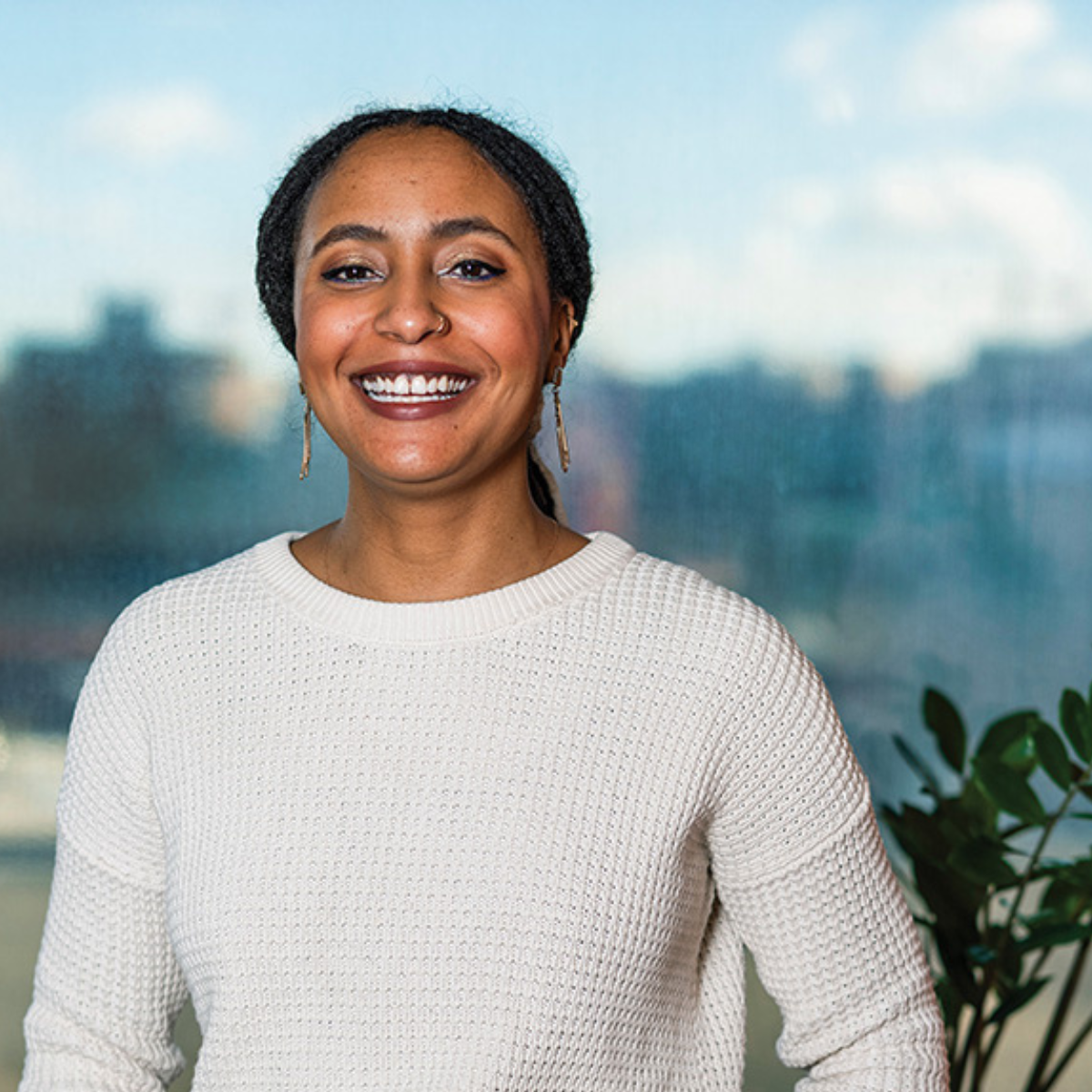 Assistant Professor Dantiel Moniz smiles for the camera. Photo by Taylor Wolfram.