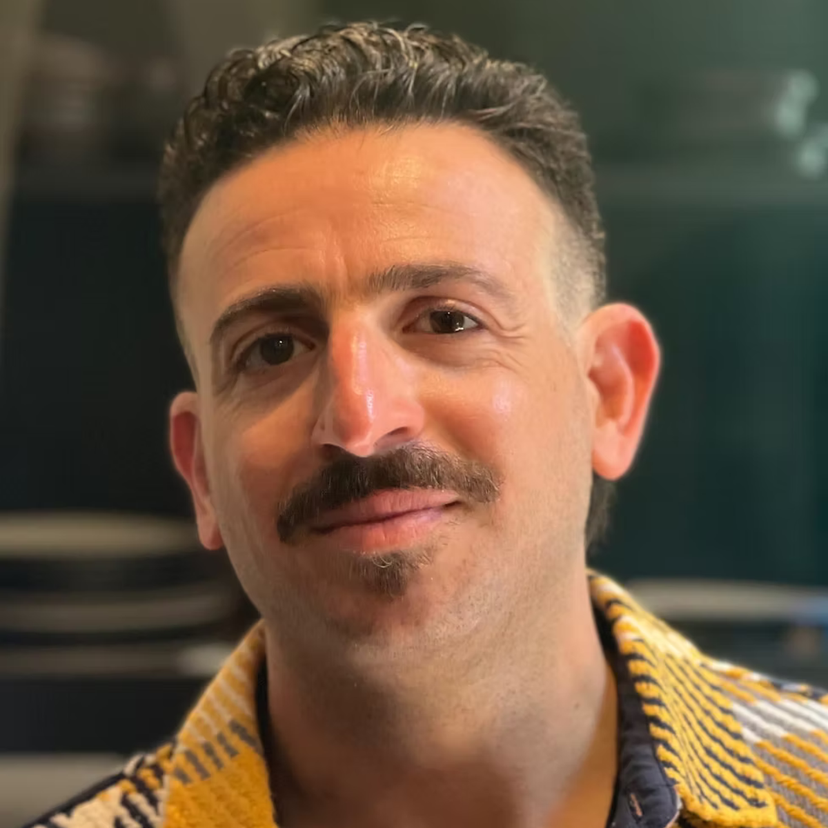Headshot image of UW English Professor Ramzi Fawaz.