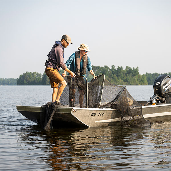 Researchers collect data on fish in Trout Lake.