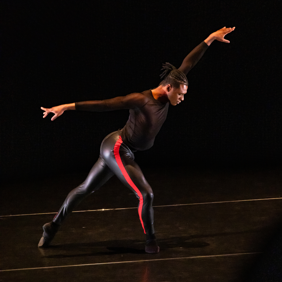 Image of a dancer performing in 2024's production of Moonshine.