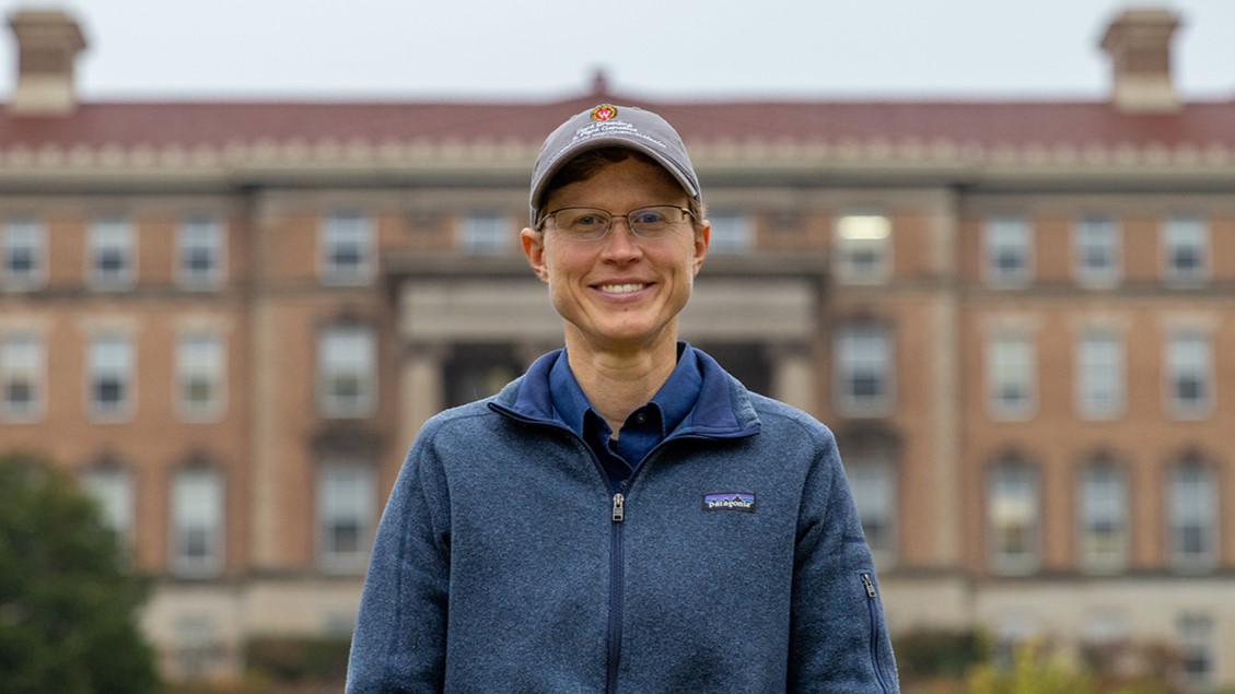 Julie Dawson smiles in front of Agricultural Hall.