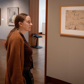 UW–Madison student Claire Hoppe supervises the galleries at the Chazen Museum of Art