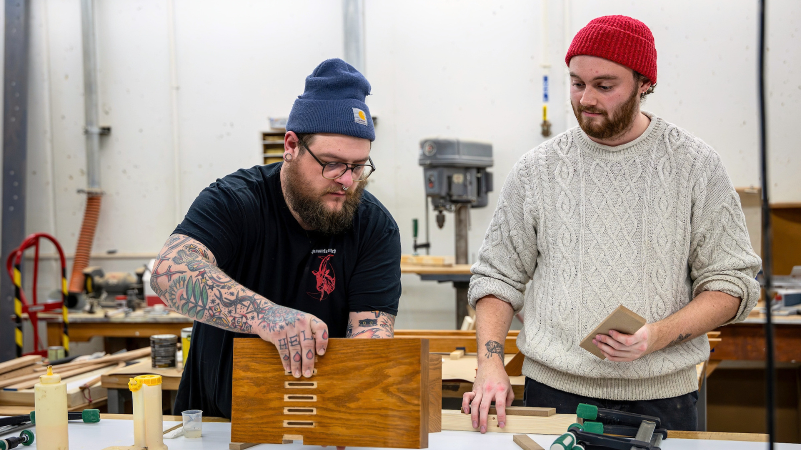 Rosco Ford and Sam Northcut work in the Chazen Museum of Art's fabrication workshop.